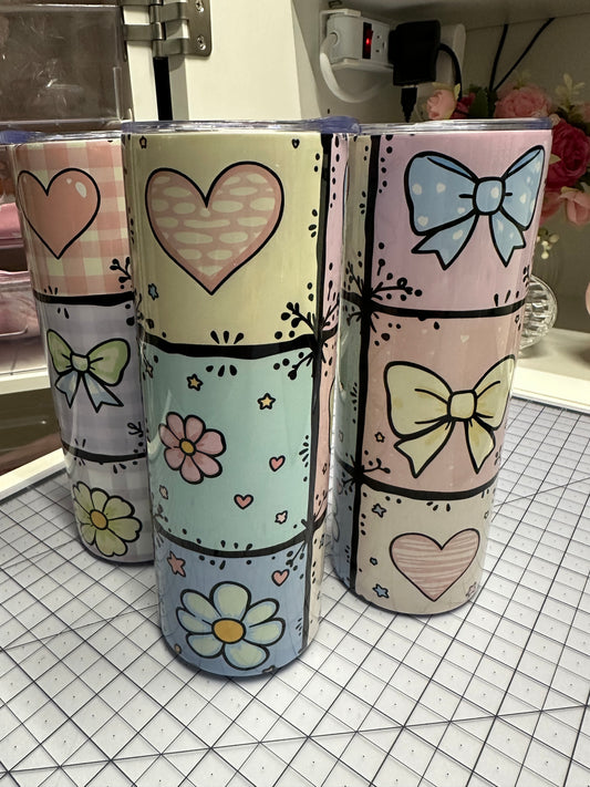 20 oz stainless steel tumblers with hearts and flowers.