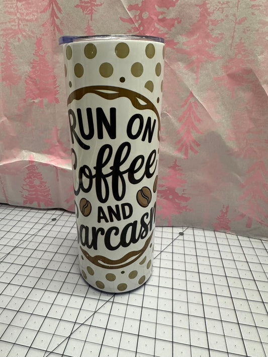 20 oz tumbler with I run on coffee and sarcasm