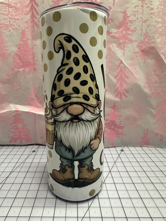 Tumbler with gnome design and polka dots on a grid background