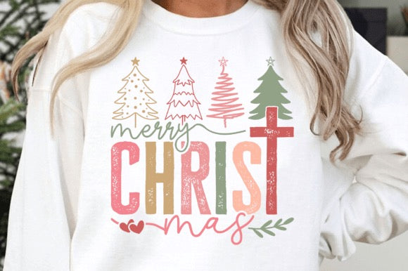 White sweatshirt with Christmas-themed design featuring trees and a cross.