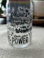 Clear tumbler with motivational text on a white background