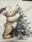 design of a bear and Christmas tree on fabric.