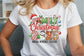 White t-shirt with Christmas-themed design and text, worn by a person.